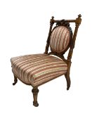 Late Victorian walnut framed nursing chair