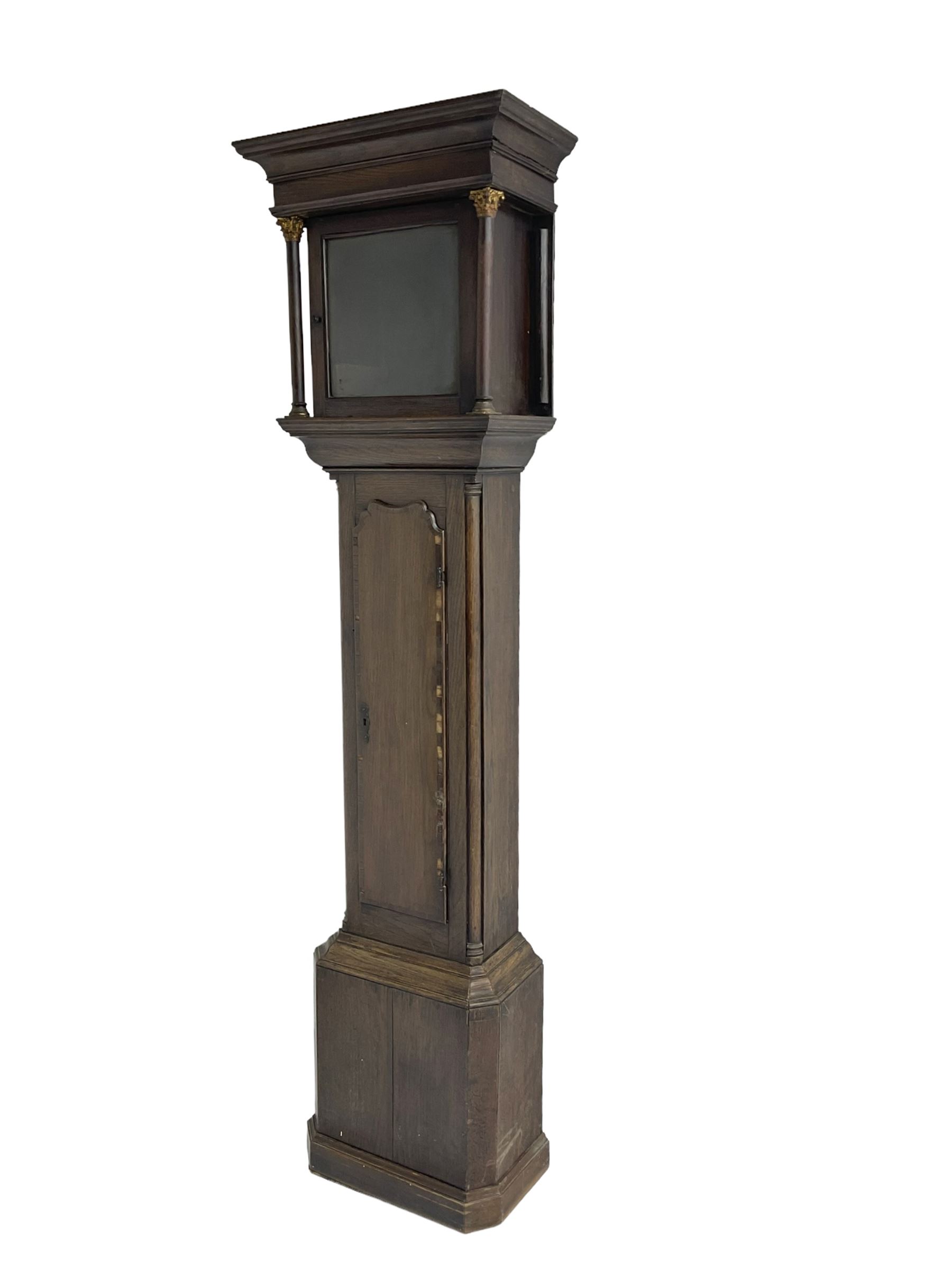 Mid 18th century - oak 30 hour longcase clock with a flat pediment and square hood door flanked by t