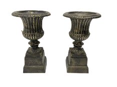 Pair Victorian design cast iron Campana shaped garden urns with base