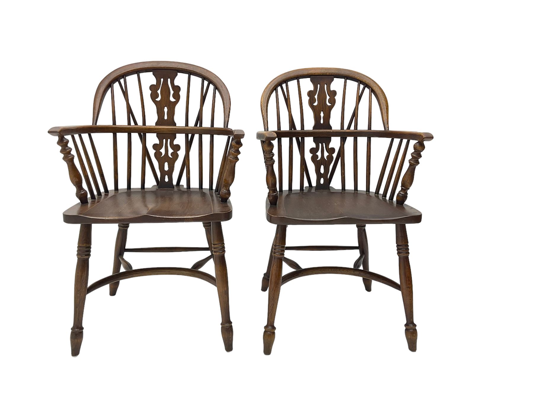 Pair late 20th century oak Windsor elbow chairs