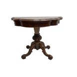 Victorian rosewood serpentine tea table