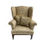 19th century wingback armchair