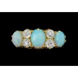 Early 20th century 18ct gold three stone opal