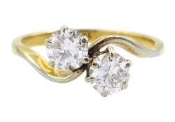 18ct gold two stone round brilliant cut diamond crossover ring