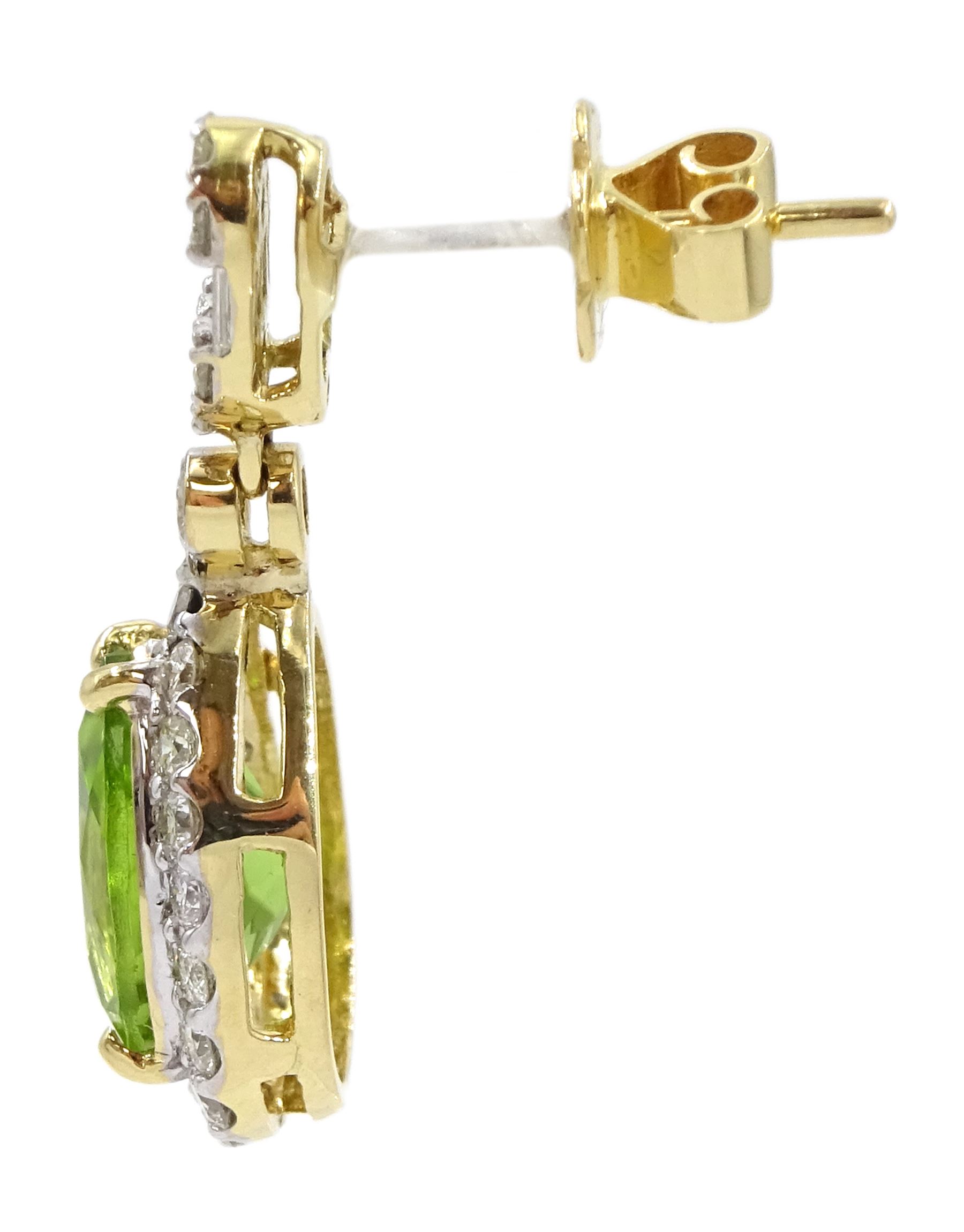 Pair of 18ct gold peridot and diamond pendant stud earrings - Image 2 of 3