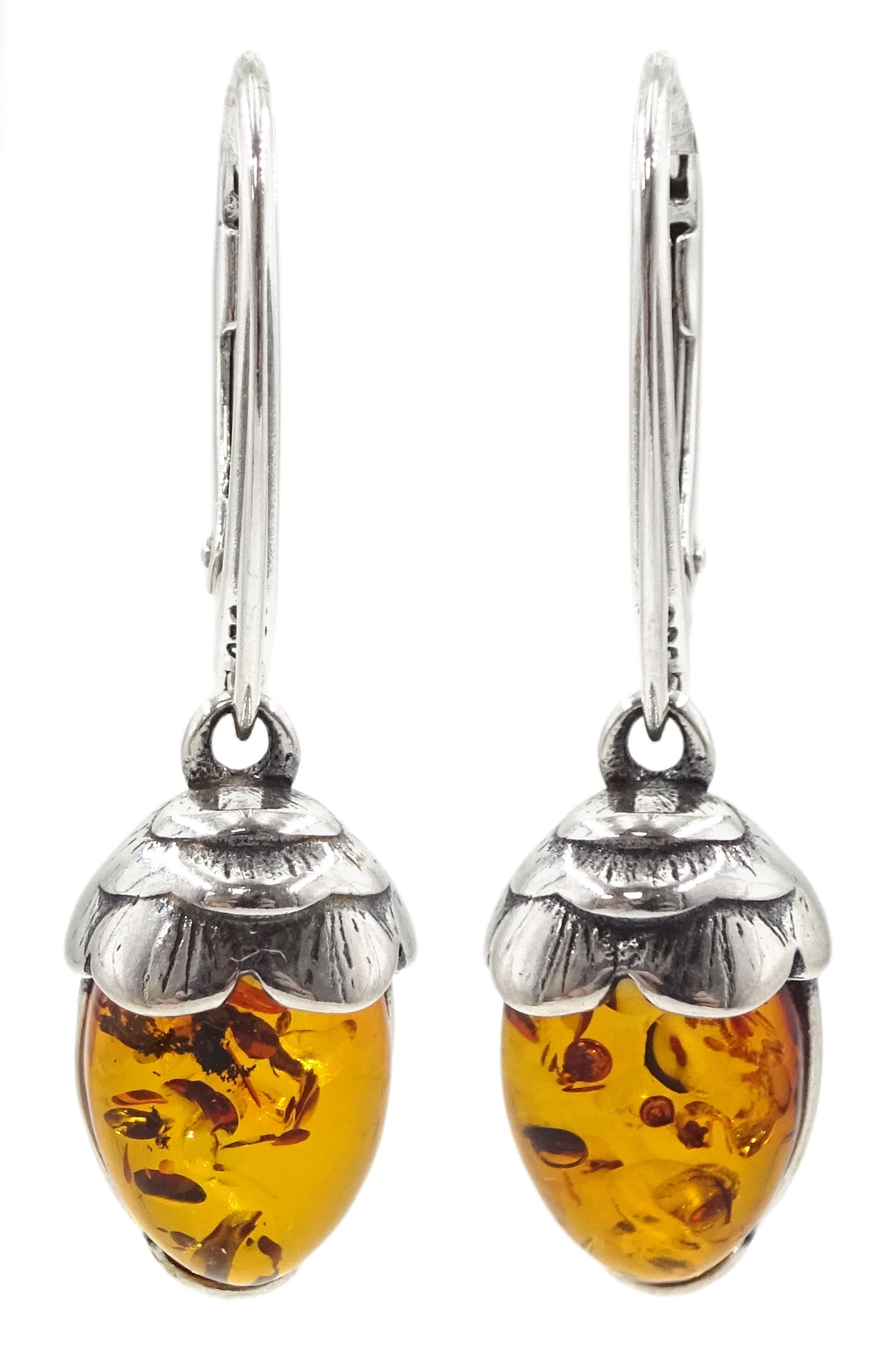 Pair of silver Baltic amber acorn pendant earrings