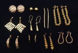 Ten pairs of 9ct gold stud earrings including half hoop and pendants