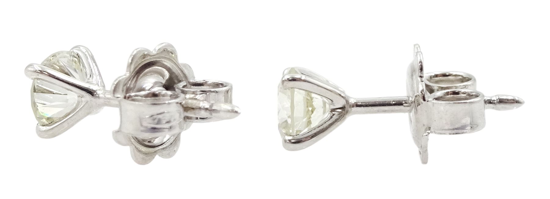 Pair of 18ct white gold round brilliant cut diamond stud earrings - Image 2 of 2