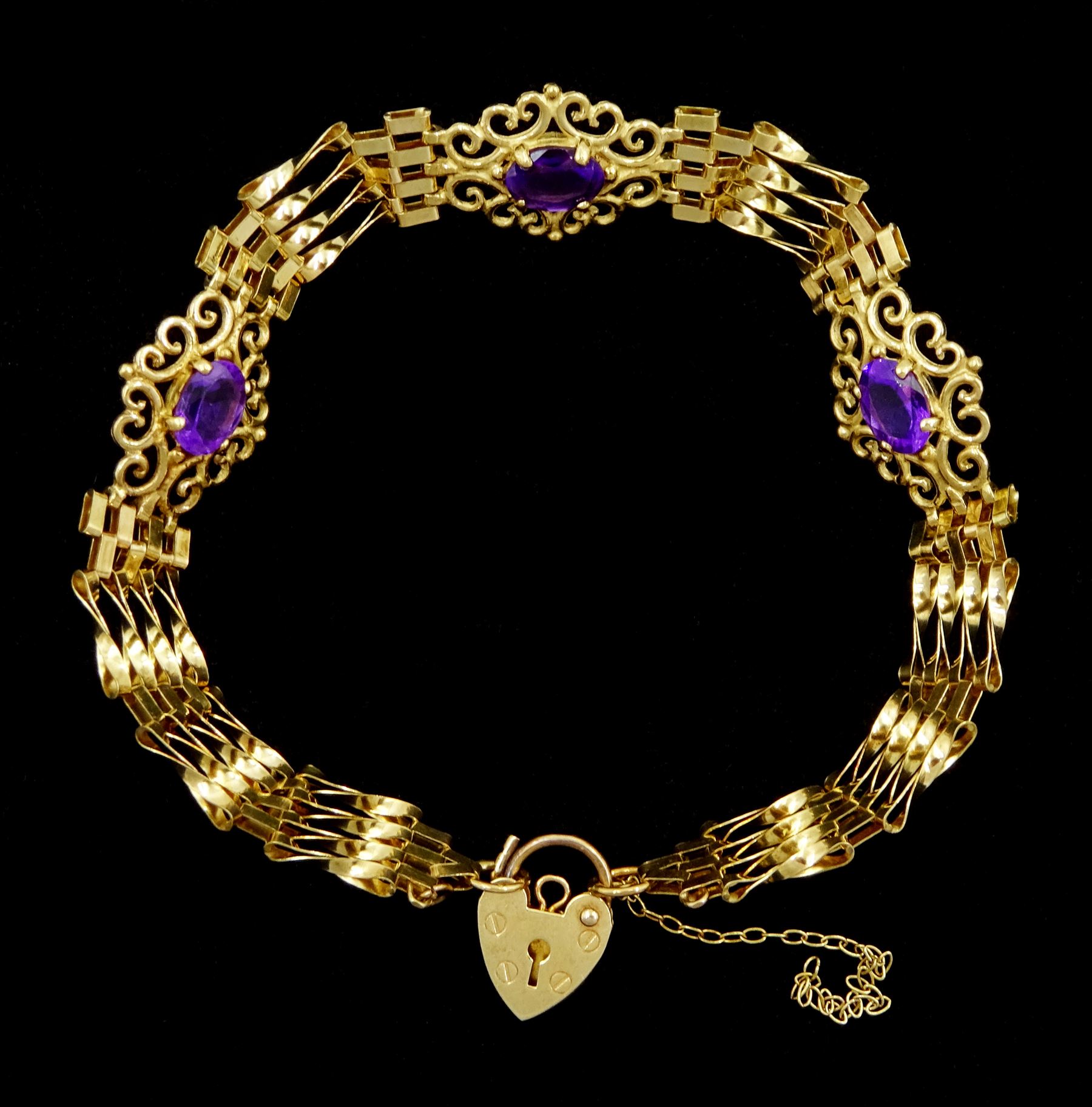 9ct gold three stone oval amethyst gate bracelet