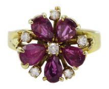 14ct gold pear shaped pink/purple stone and round brilliant cut diamond flower head cluster ring