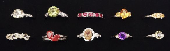 Ten silver stone set rings