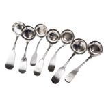 Collection of seven 19th century Scottish silver Fiddle pattern ladles/sifting spoon