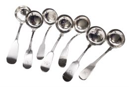 Collection of seven 19th century Scottish silver Fiddle pattern ladles/sifting spoon
