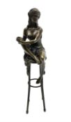 Art Deco style bronze modelled as a female figure seated upon a chair