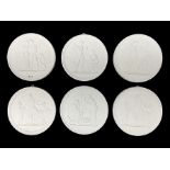 Six Royal Copenhagen white biscuit roundels