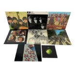 Eight The Beatles and related vinyl records