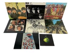 Eight The Beatles and related vinyl records