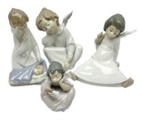 Four Lladro figures