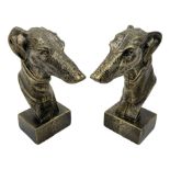 Pair of bronzed cast iron greyhound busts on plinths