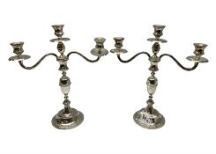 Pair of silver plated three branch candelabra