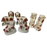 Two pairs of Staffordshire style dogs