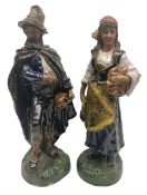 Pair of late 19th century continental glazed stoneware Black Forest style figures