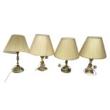 Four brass table lamps with pleated lampshades