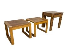 Mid-to late 20th century nest three teak side tables and pair two others (5)