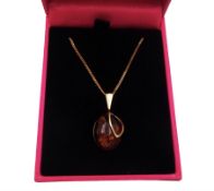 Silver-gilt oval Baltic amber pendant necklace