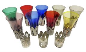 Fluted glasses of various colours