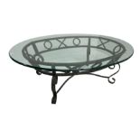 Wrought metal and glass top oval coffee table