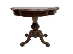 Victorian rosewood serpentine tea table