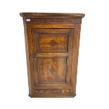 George III oak and mahogany banded wall hanging corner cupboard