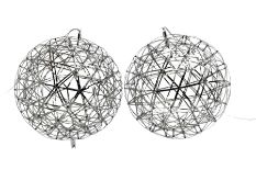 Pair polished metal spherical cage LED light fittings