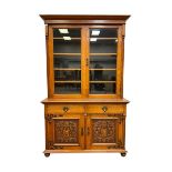 Late 19th century oak bookcase on cupboard