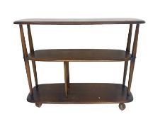 Ercol - elm and beech three tier stand on castors