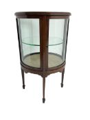 Edwardian inlaid mahogany drum shaped vitrine or bijouterie table with glass top and sides and singl