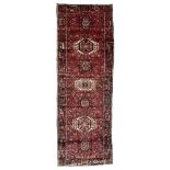 Persian Karajeh crimson ground runner rug