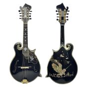 Eastern F-hole eight-string mandolin with black finish and mother-of-pearl inlay of a man riding a w