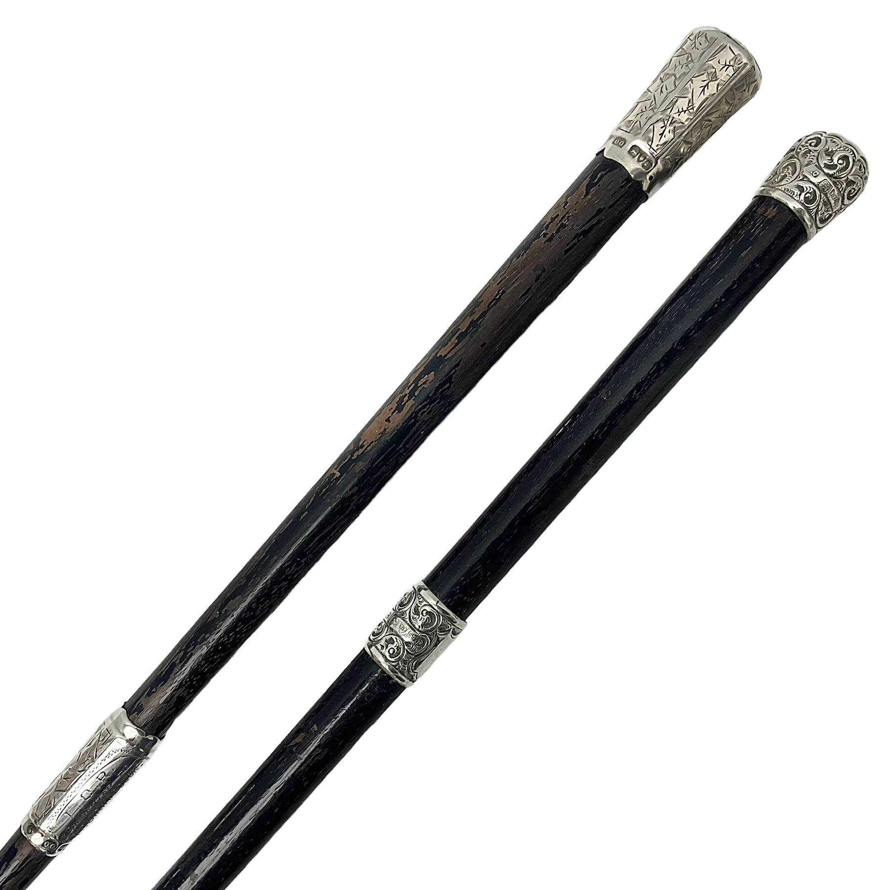 Two early 20th century conductor's ebonised batons each with three silver mounts; one hallmarked Lon