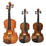 Three Stentor Student violins - three-quarter size with 33cm two-piece back; and two quarter size ea