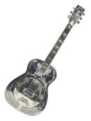 Ozark metal cased resonator guitar with all over chased foliate decoration to the polished finish an