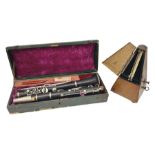Early 20th century Hawkes and Son simple system hardwood clarinet serial no.1HM257102; cased; and a