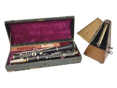 Early 20th century Hawkes and Son simple system hardwood clarinet serial no.1HM257102; cased; and a