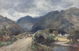 Owen Bowen (Staithes Group 1873-1967): Sheep Crossing a Stone Bridge in the Lake District