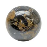 Brown mottled marble sphere