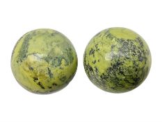 Pair of green serpentine spheres