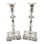 Pair of late Victorian silver mounted candlesticks