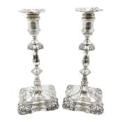 Pair of late Victorian silver mounted candlesticks