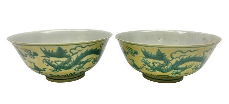 Pair of Chinese famille jaune bowls